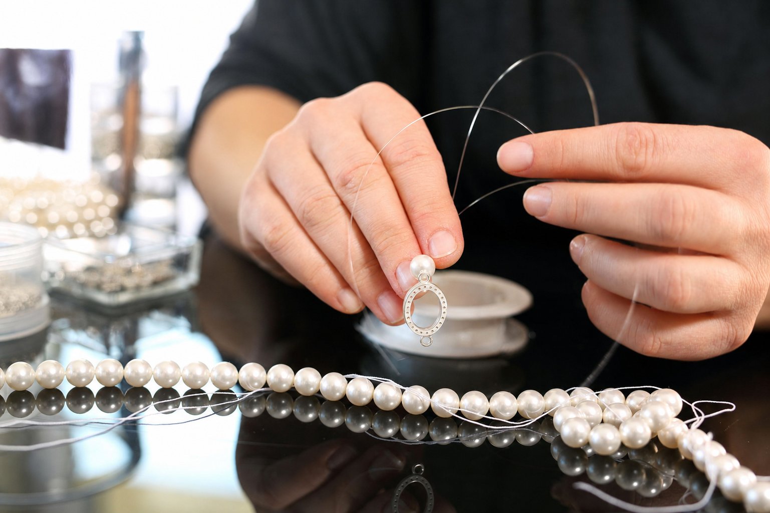 Pearl pendant and strands in the Adiba Ayu workshop